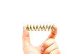 Hand holding rainbow steel spring. Royalty Free Stock Photo