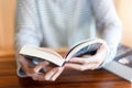 Hand holding and read a book at home Royalty Free Stock Photo