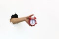 Hand holding a red alarm clock Royalty Free Stock Photo