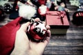 hand holding red bauble Christmas decoration Royalty Free Stock Photo