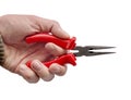 Hand holding red and black pointed pincers craft isolated Royalty Free Stock Photo