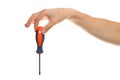 Hand holding a red and black screwdriver isolated over white background Royalty Free Stock Photo