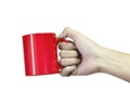 Hand holding red coffee mug isolated on white background. Template of ceramic container for drink.  Clipping path Royalty Free Stock Photo