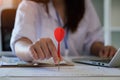 Hand holding red darts arrows in the target. Concept of business goal and strategy and future Royalty Free Stock Photo