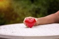Hand-holding red heart, promoting family love, valentine`s Day, world mental health day and world heart day, Life and health insur Royalty Free Stock Photo