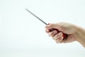 A hand holding red screwdriver Royalty Free Stock Photo