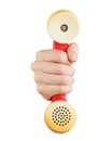 Hand holding red telephone receiver Royalty Free Stock Photo