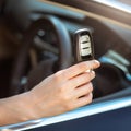 Hand holding remote car key Royalty Free Stock Photo