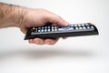 Hand Holding Remote Control Side View Royalty Free Stock Photo