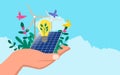 Hand holding renewable energy icons adorned with natures beauty Royalty Free Stock Photo