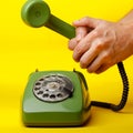 Hand holding a retro telephone Royalty Free Stock Photo