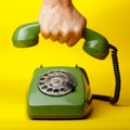 Hand holding a retro telephone Royalty Free Stock Photo