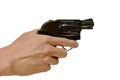 hand holding revolver gun and finger safety on trigger in white background Royalty Free Stock Photo