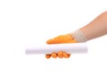 Hand holding rolled paper. Royalty Free Stock Photo