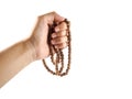 Hand holding rosary White background Royalty Free Stock Photo