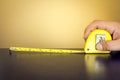 Hand holding a roulette meter Royalty Free Stock Photo