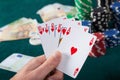 Hand holding royal flush Royalty Free Stock Photo