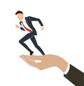 Hand holding running businessman vector