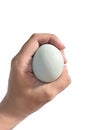 hand holding salted egg from ducks egg isolated on white background Royalty Free Stock Photo