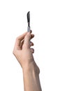 The hand holding the scalpel, white background, isolated