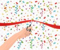 Hand holding scissors and cutting red ribbon on the transperant background with confetti. Royalty Free Stock Photo