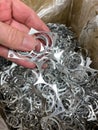 Hand holding scrap aluminium cuttings Royalty Free Stock Photo