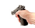 A hand holding a semi automat gun pointing forward Royalty Free Stock Photo