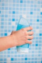 Hand holding shower gel Royalty Free Stock Photo