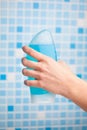 Hand holding shower gel Royalty Free Stock Photo