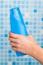 Hand holding shower gel Royalty Free Stock Photo