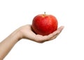 Hand holding and showing a perfect red apple Royalty Free Stock Photo