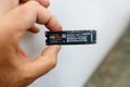 hand holding showing Samsung nvme ssd unboxing: High-speed drive