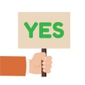 Hand holding sign with the word Yes. Royalty Free Stock Photo