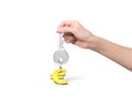Hand holding silver key with golden euro sign shape keyring Royalty Free Stock Photo