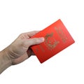 Hand holding Singapore Passport isolated on white background Royalty Free Stock Photo
