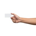 A hand holding a small blank rectangular card or tag against a plain background Royalty Free Stock Photo