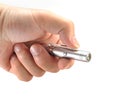 Hand holding small flashlight Royalty Free Stock Photo