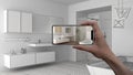 Hand holding smart phone, AR application, simulate furniture and interior design products in real home, architect designer concept