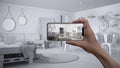 Hand holding smart phone, AR application, simulate furniture and interior design products in real home, architect designer concept Royalty Free Stock Photo
