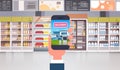 Hand Holding Smart Phone In Supermarket Order Grocery Products Delivery Food Shopping Concept