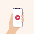 Hand holding smart phone in vertical position banner. Screen with play button. Concept of live streaming, video player. Vector Royalty Free Stock Photo