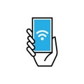 Hand holding smart phone with wifi icon on screen Royalty Free Stock Photo