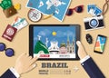Hand holding smart tablet booking travel destination.Brazil famous places.Vector concept banners in flat style with the set of tr Royalty Free Stock Photo