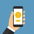 Hand holding smartphone with buy bitcoin. Online crypto payment concept. Flat style - stock vector Royalty Free Stock Photo