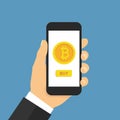 Hand holding smartphone with buy bitcoin. Online crypto payment concept. Flat style - stock vector Royalty Free Stock Photo