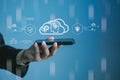 Hand holding a smartphone with cloud computing and AI interface,showing data protection, cybersecurity,and secure digital Royalty Free Stock Photo