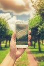 Hand Holding Smartphone With Cloud Icon On Screen Against Green Trees, Cloud Computing Concept Royalty Free Stock Photo