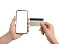 Hand holding smartphone and credit card isolated on white background Royalty Free Stock Photo