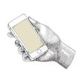 Hand holding smartphone,Human hand drawing engraving illustration