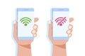 Hand holding smartphone with No wifi sign and good wifi connection. Bad internet. Royalty Free Stock Photo